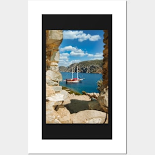 Sailboat anchored in an aegean bay in Turkey Posters and Art